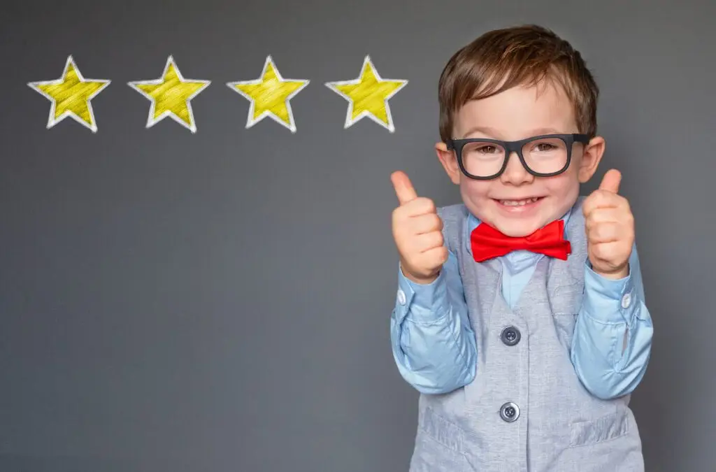 Reviews. Cute little boy giving thumbs up